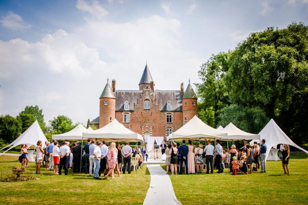 Wedding ceremony in front of chateau in France