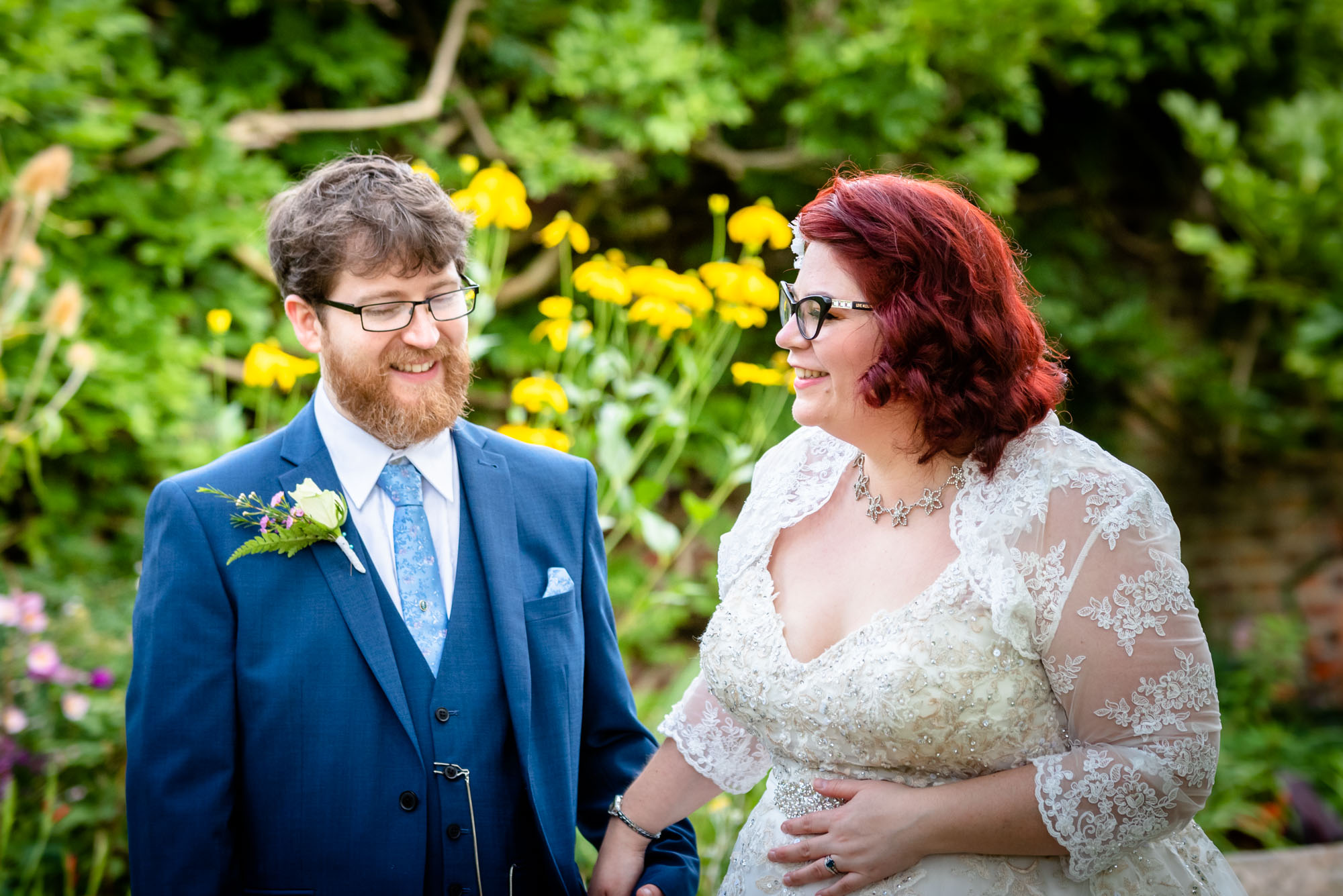 Bride and groom in parsonage garden