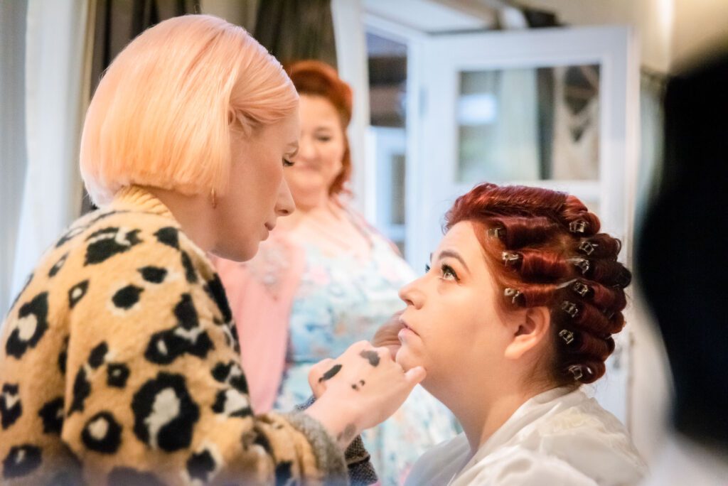 makeup artist doing lips