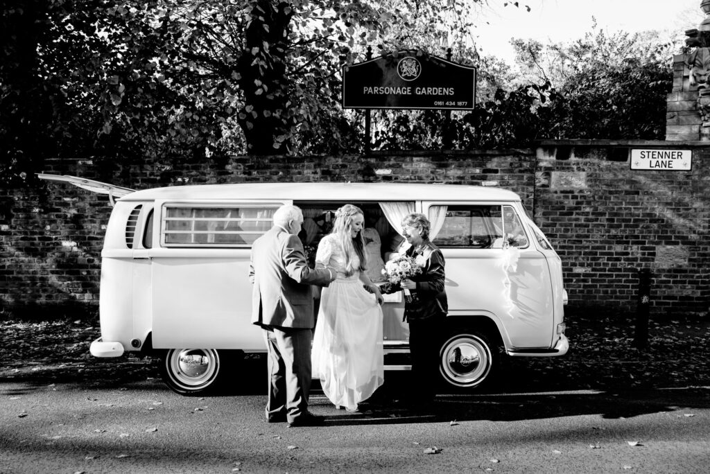 Bride arriving in a vintage VW camper van