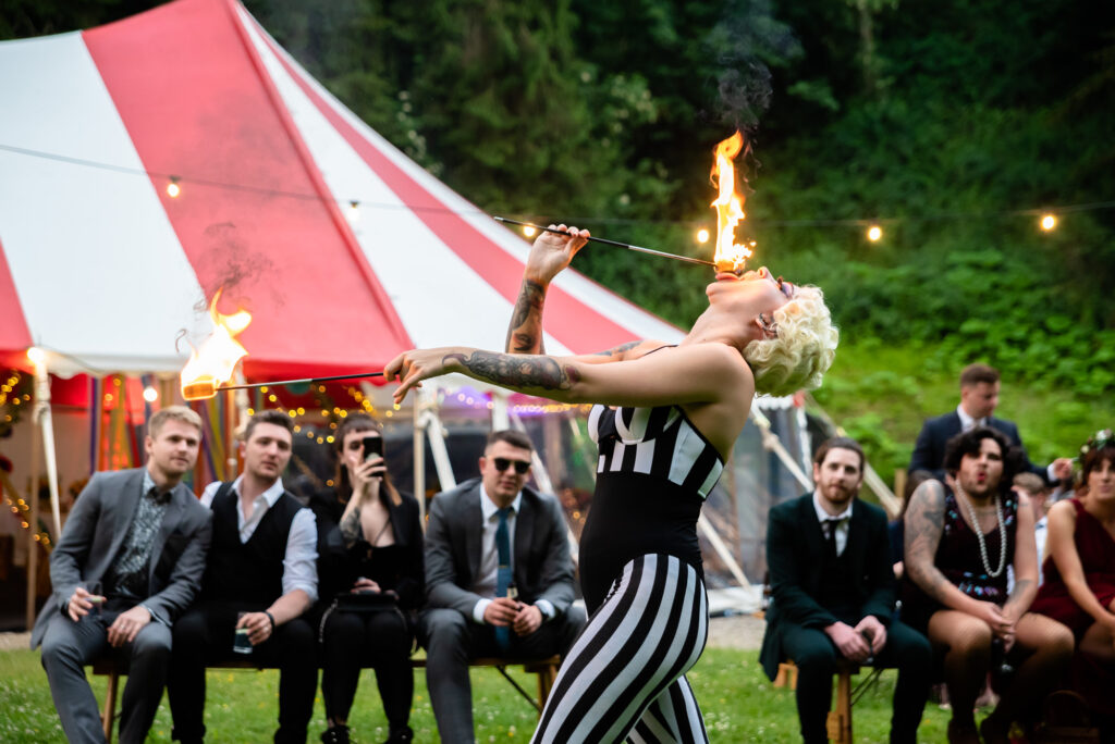 Fire breather Bella Stanyer performing at a wedding