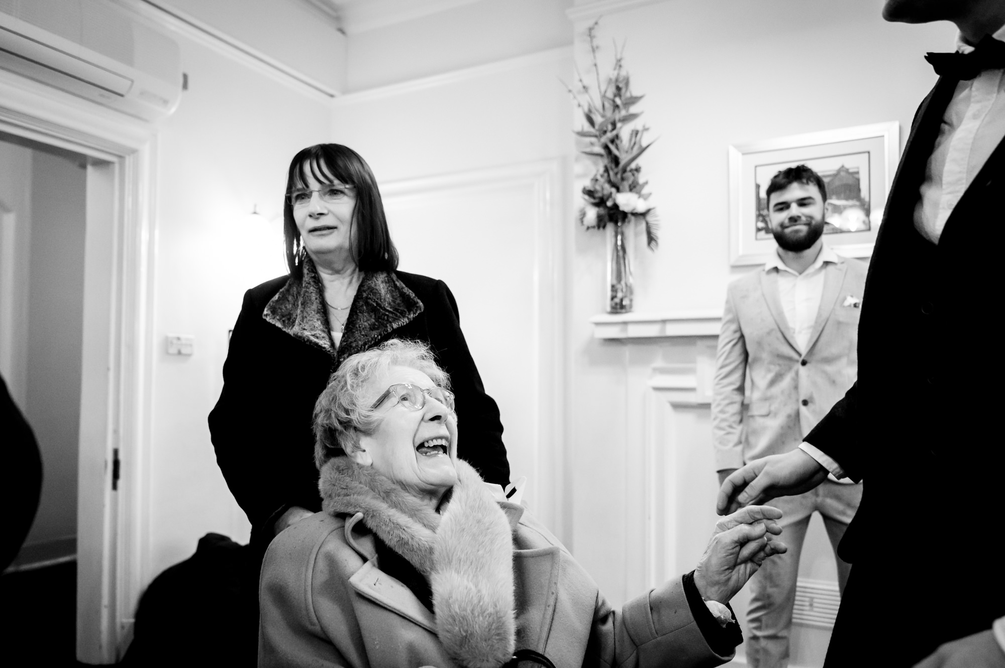 Grandma greeting the groom 