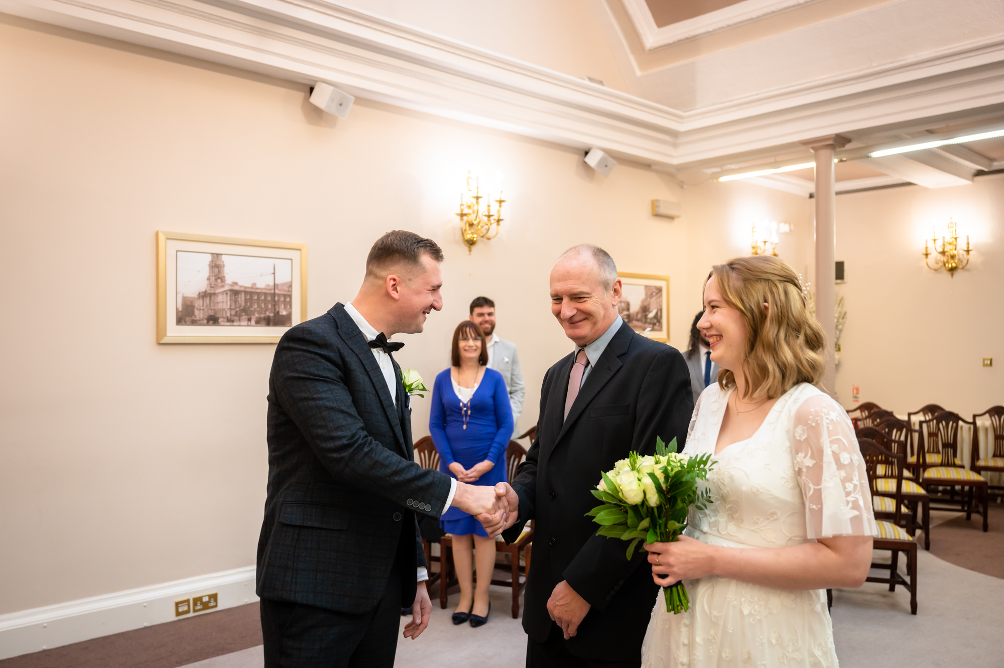 groom saying hello to the father of the bride