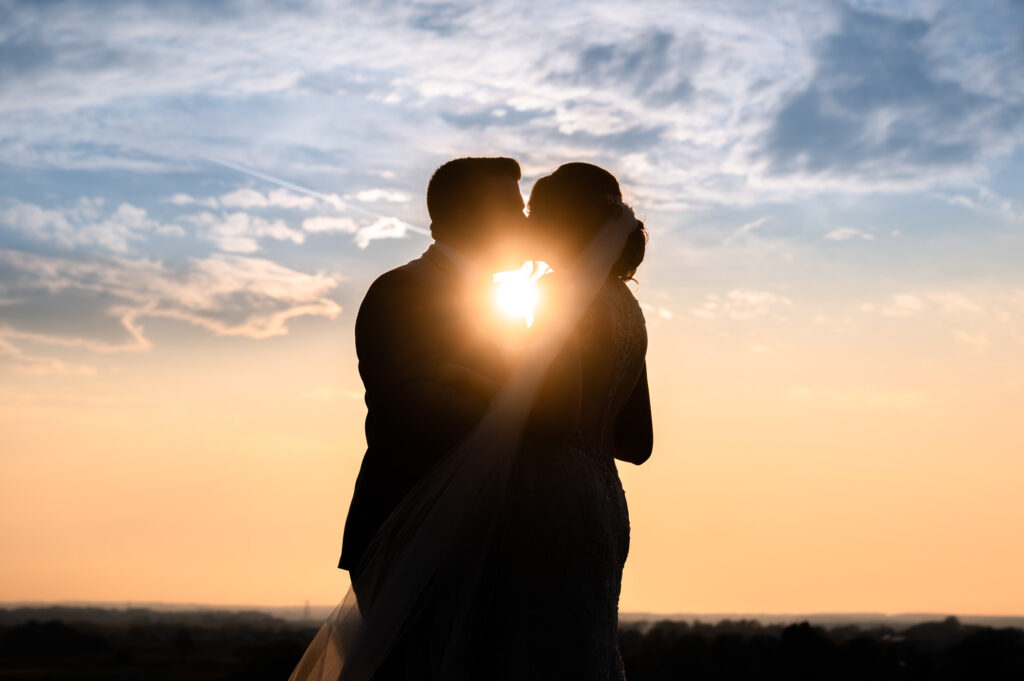 Kiss in the sunset at West Tower