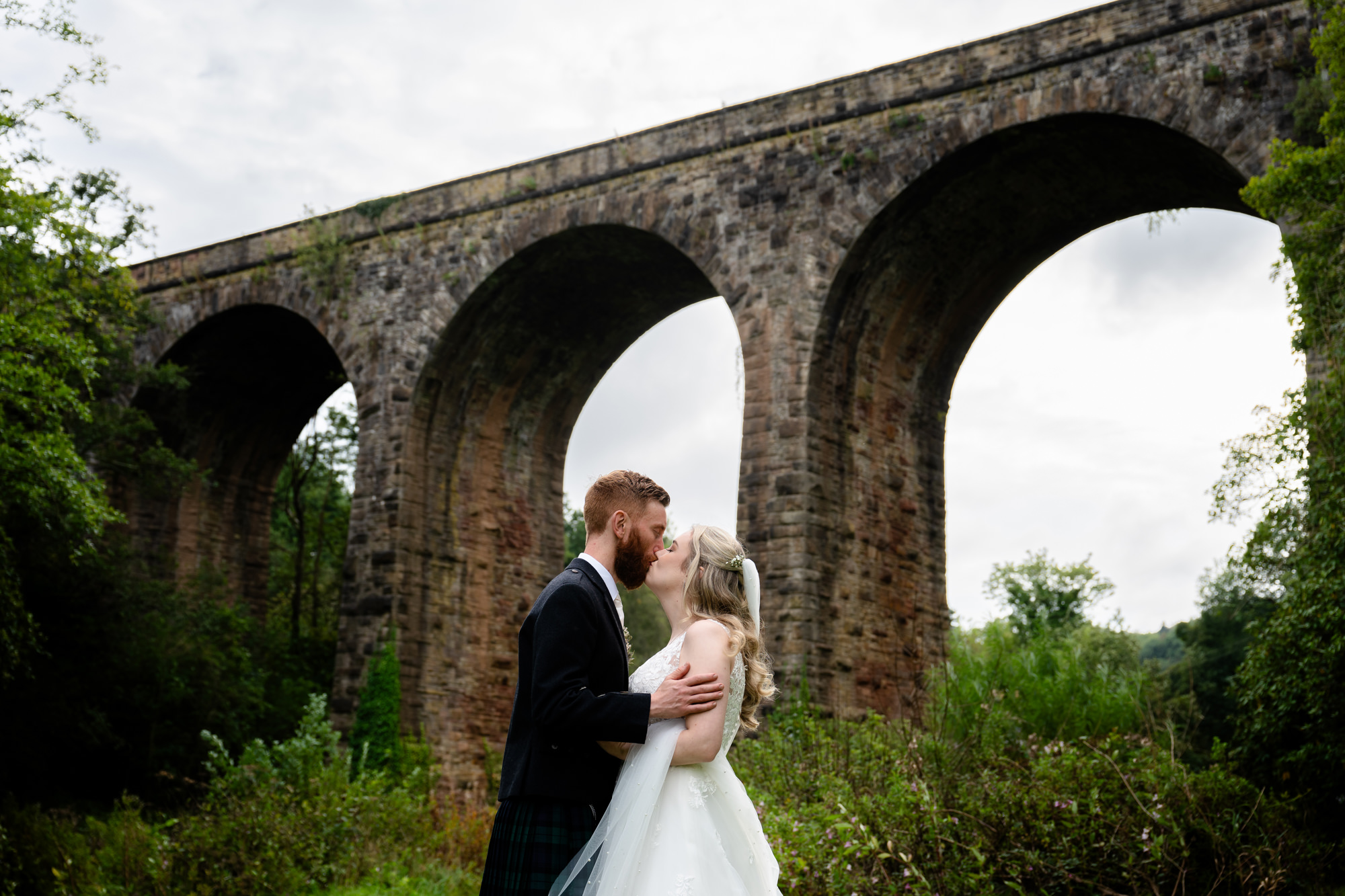 Bridal portrait in front of the railway bridge at The Roman Lakes