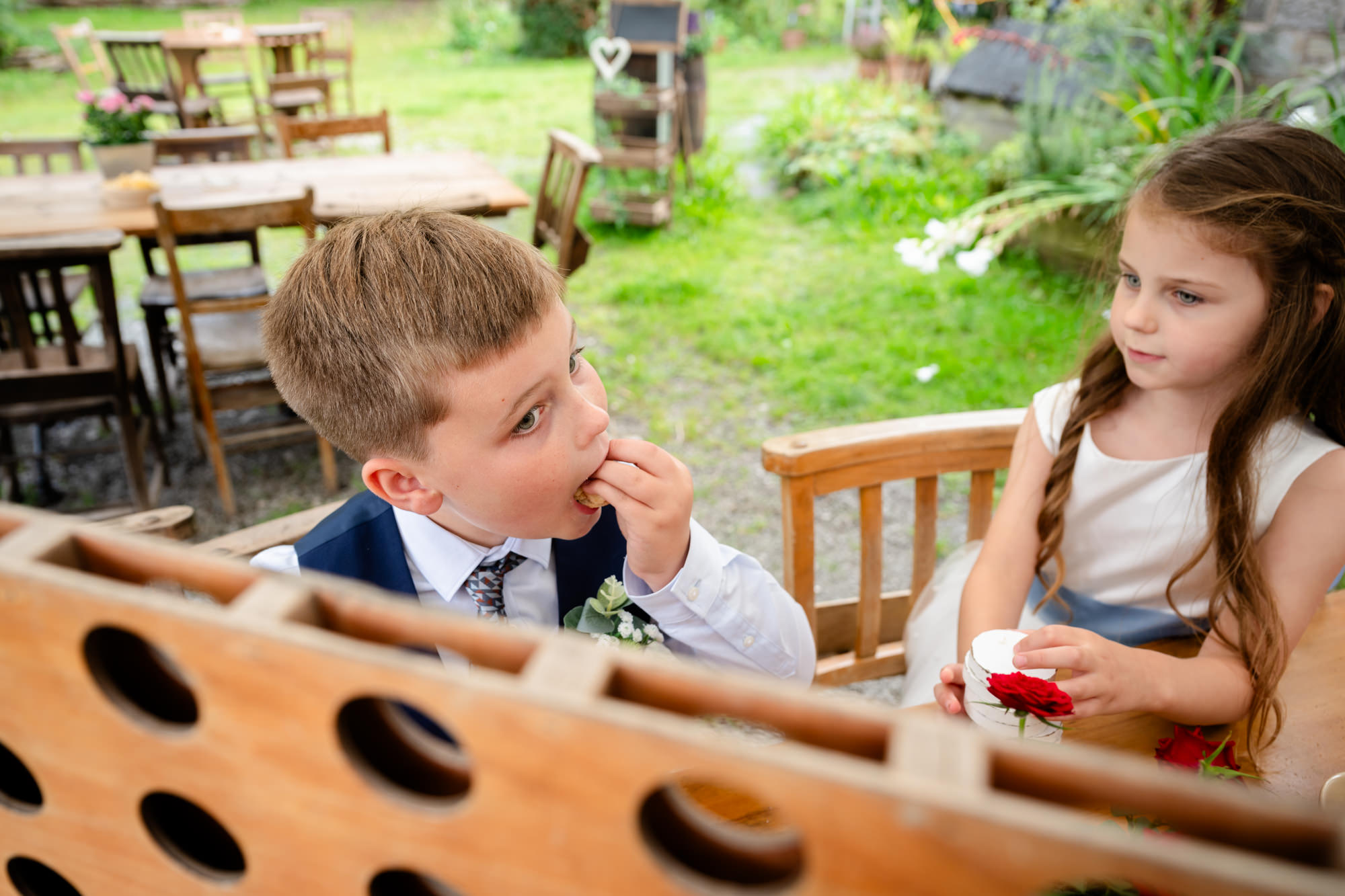 boy playing connect four at The Roman Lakes