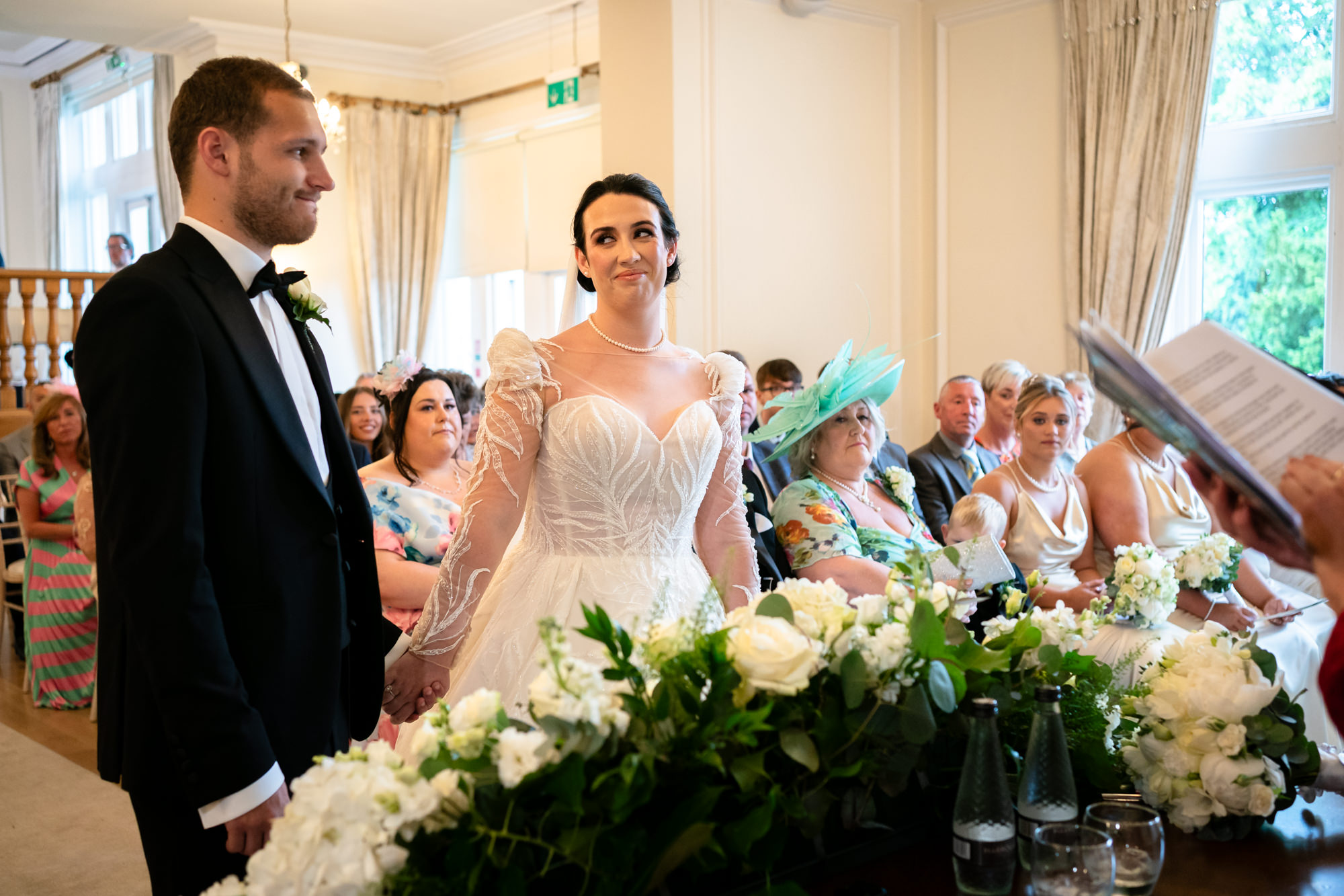 Bride looking at the groom as if he is in trouble