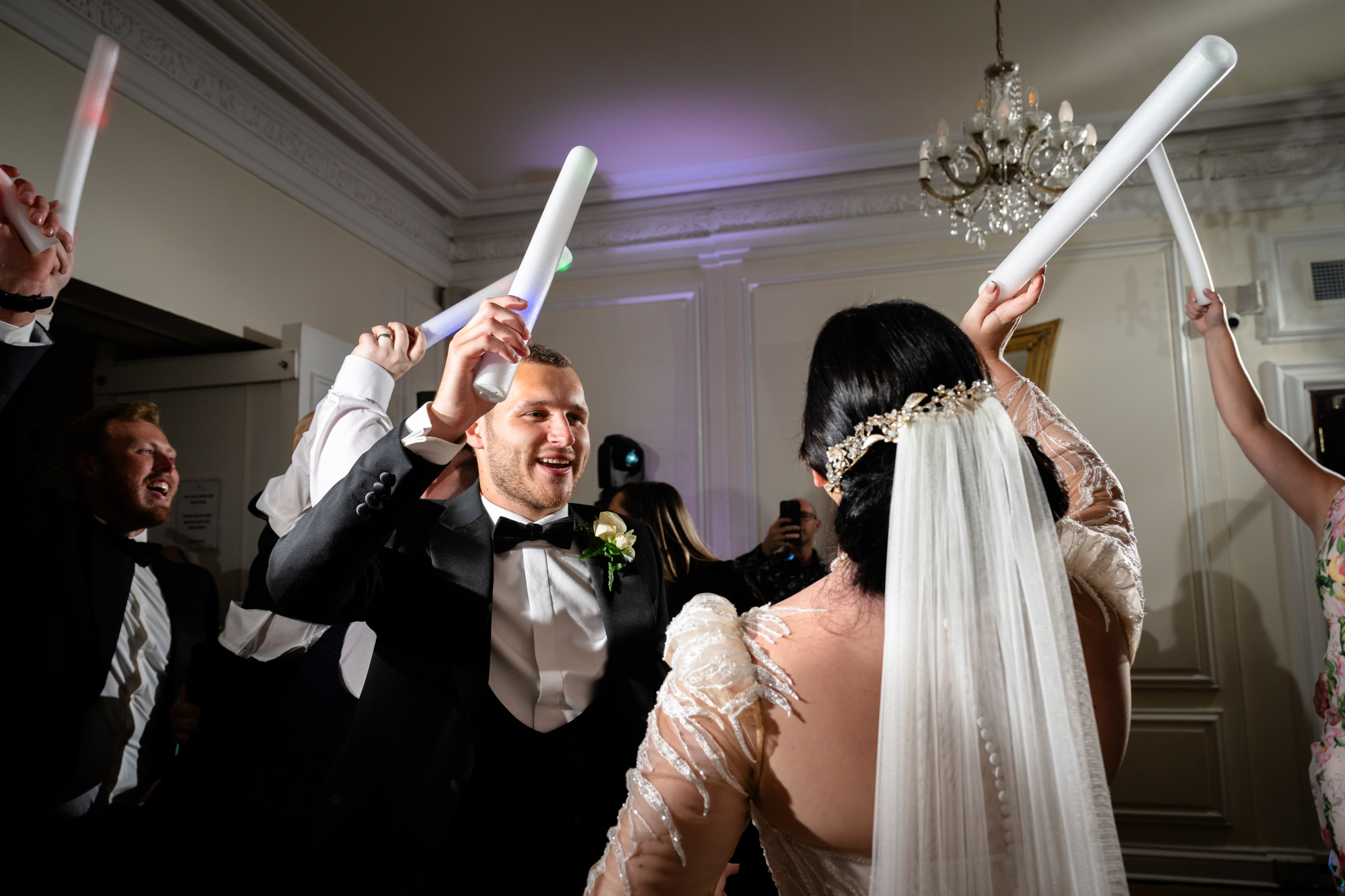 GRoom dancing with a flashing stick at West Tower