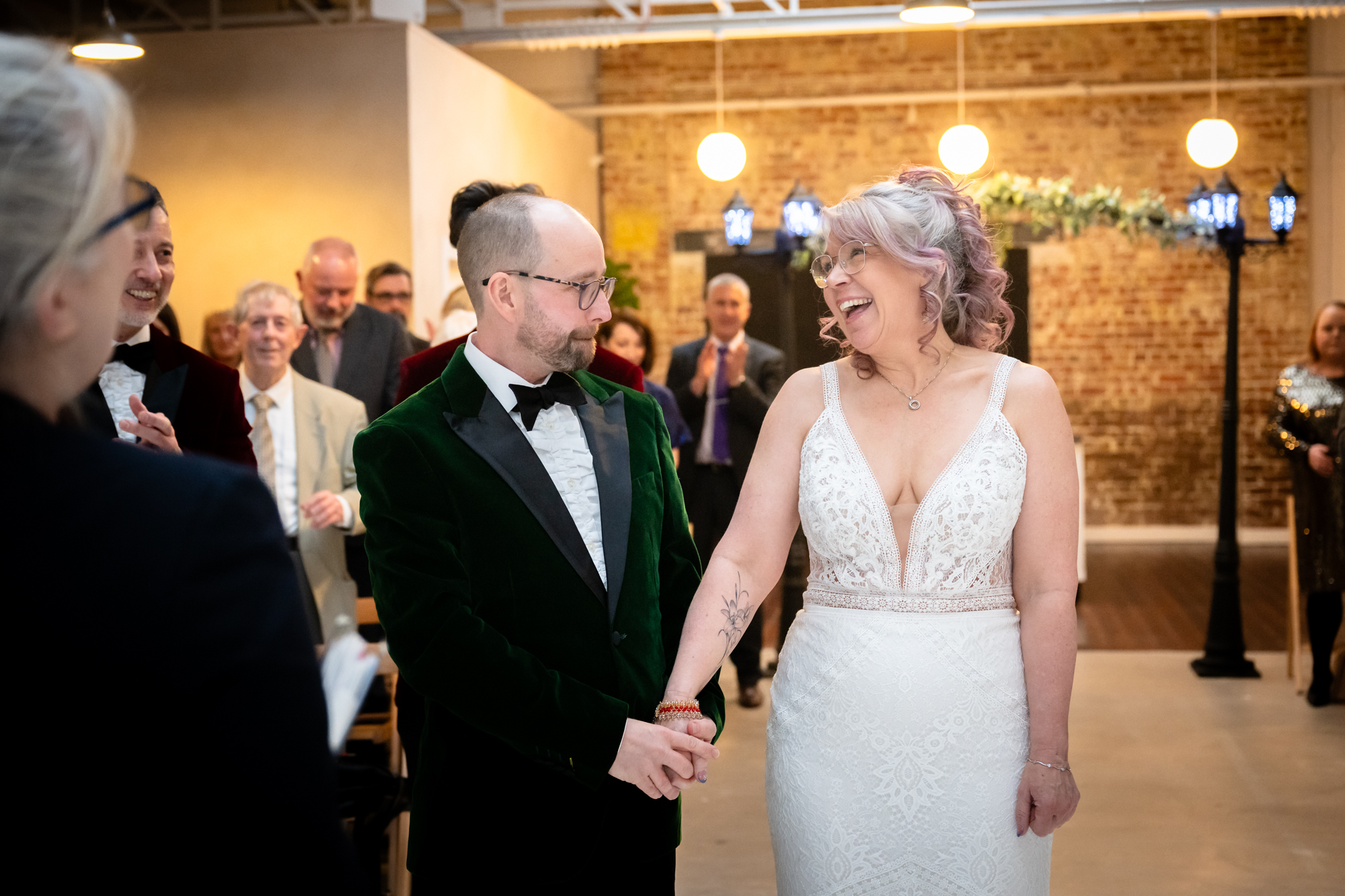 Bride laughing at the groom 