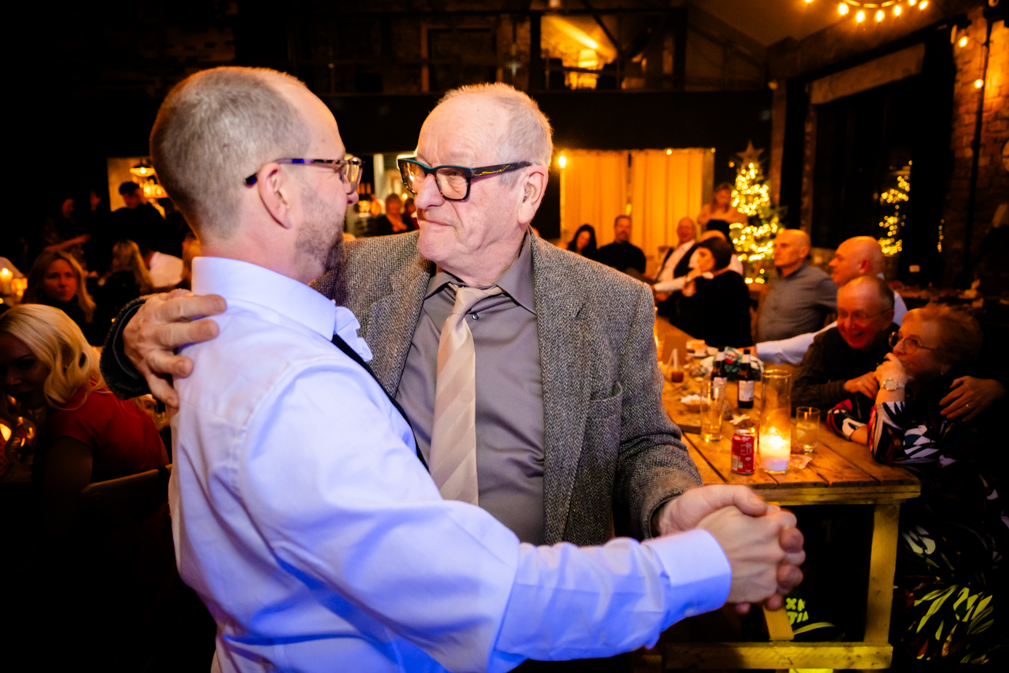 groom dancing with his dadat Scale