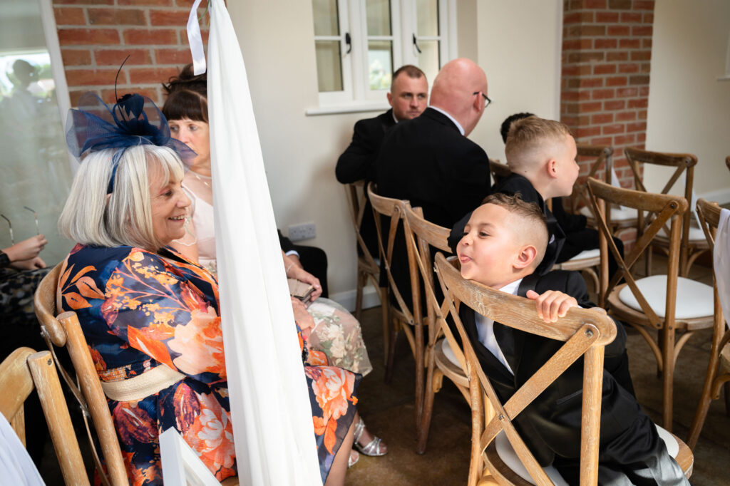 Boy pulling a funny face before the ceremony