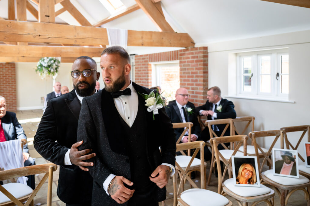 Groom looking stressed before the ceremony at Hanbury Barns