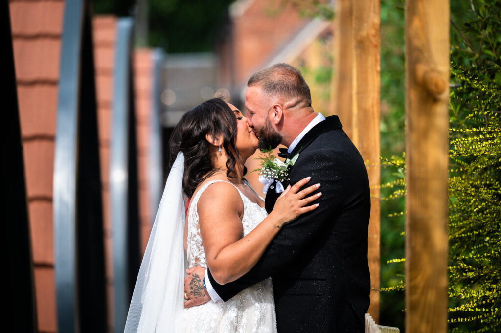 Kissing with the Hanbury pods in the background