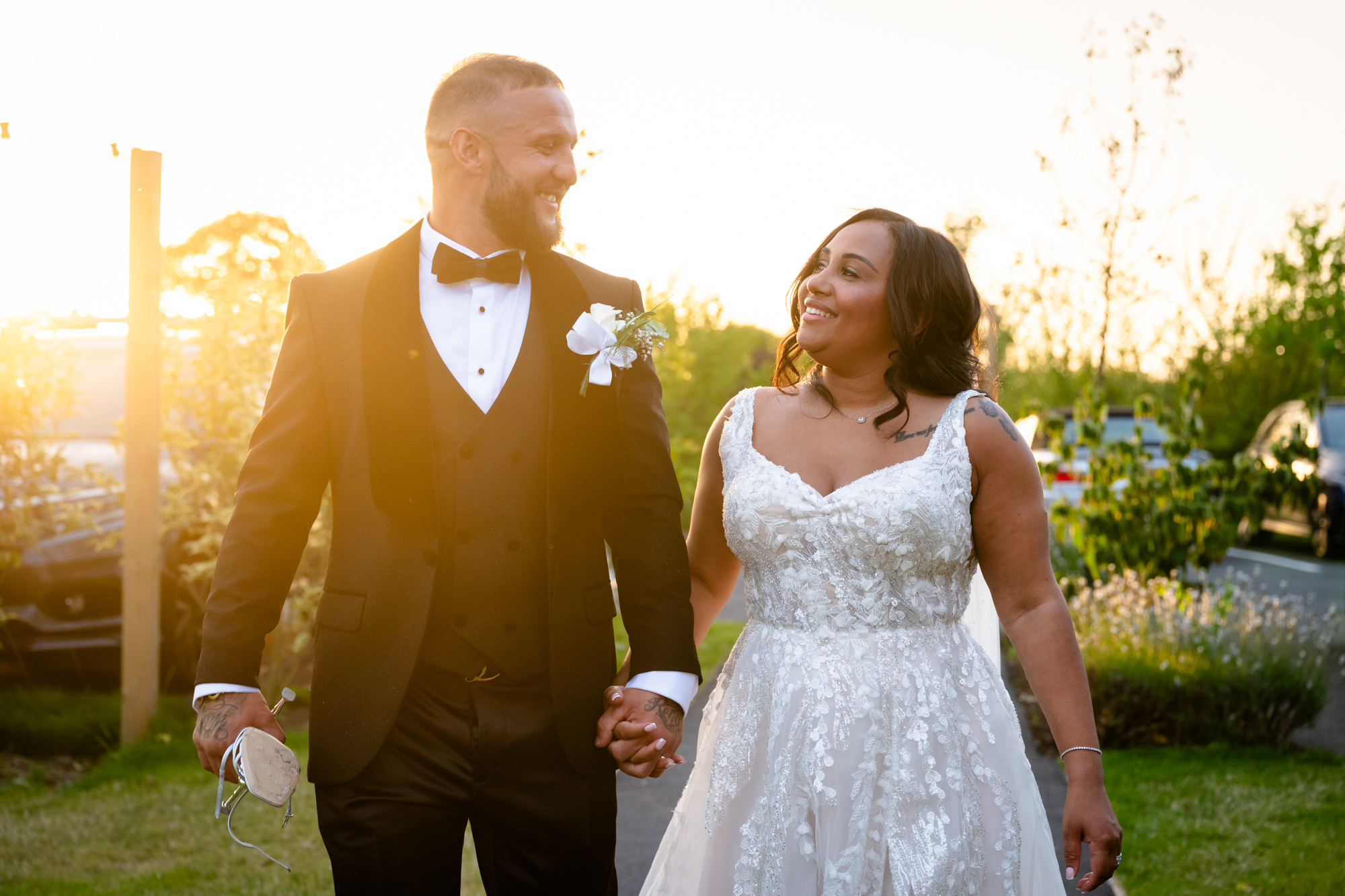 Bride and groom in golden hour at Hanbury Barns