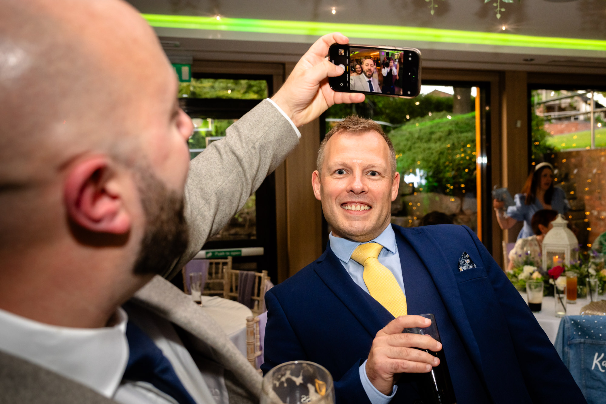 Guest taking a selfie on the dancefloor at Moddershall Oaks.