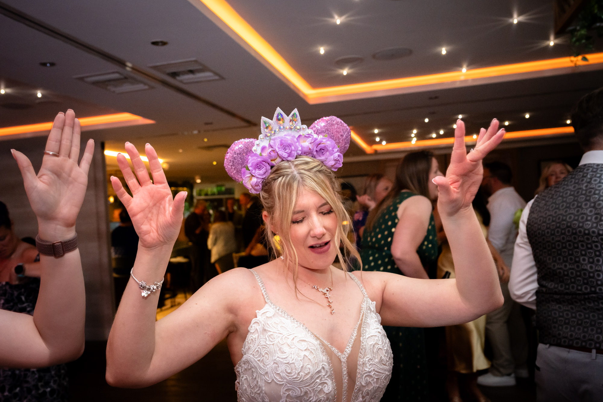 Bride dancing on the dancefloor at Moddershall Oaks.