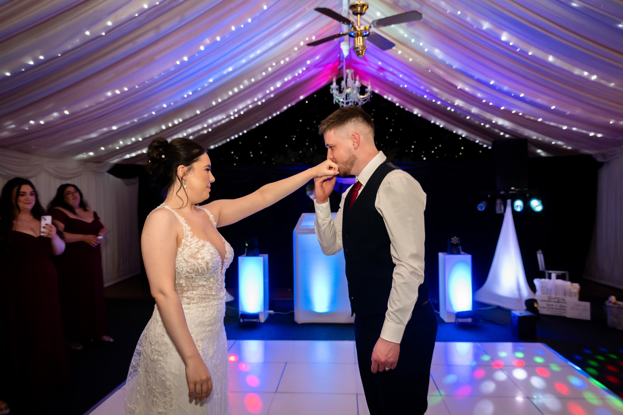 The bride and groom begin their first dance at their wedding at Heaton House Farm.