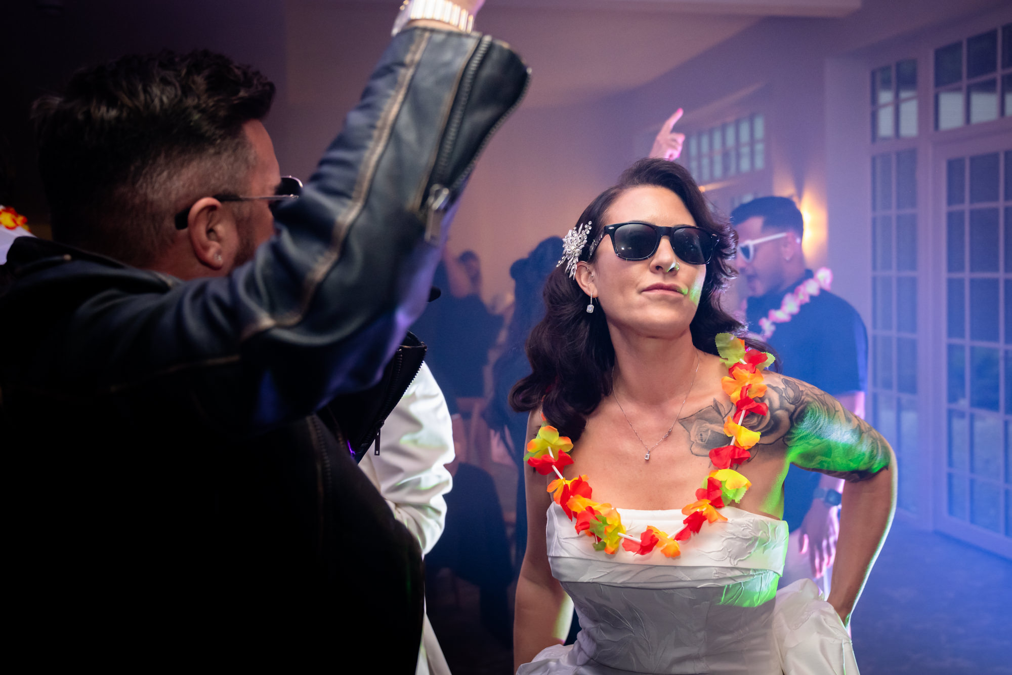 Bride dancing with a George Michael impersonator