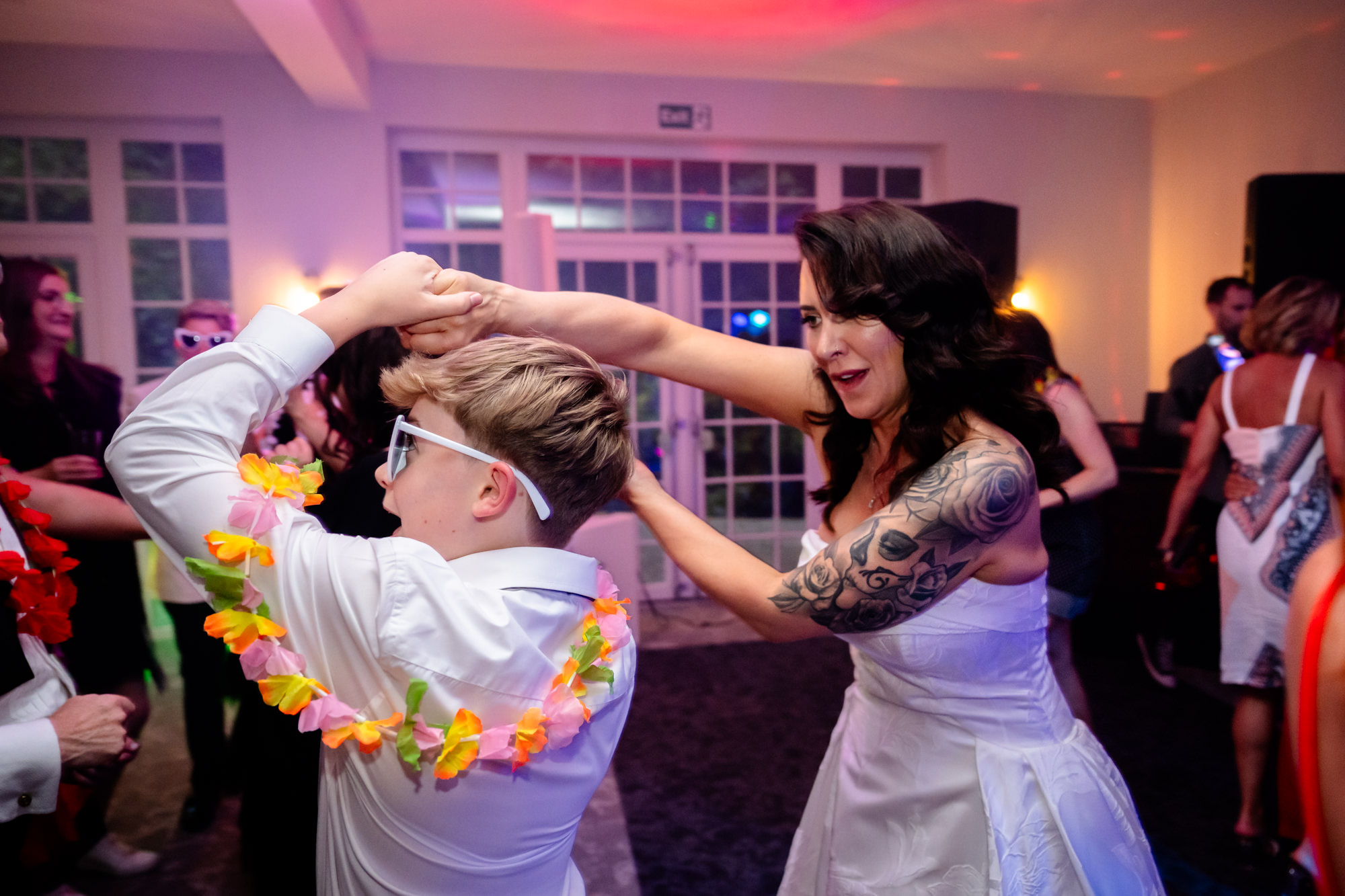 Bride dancing with her son