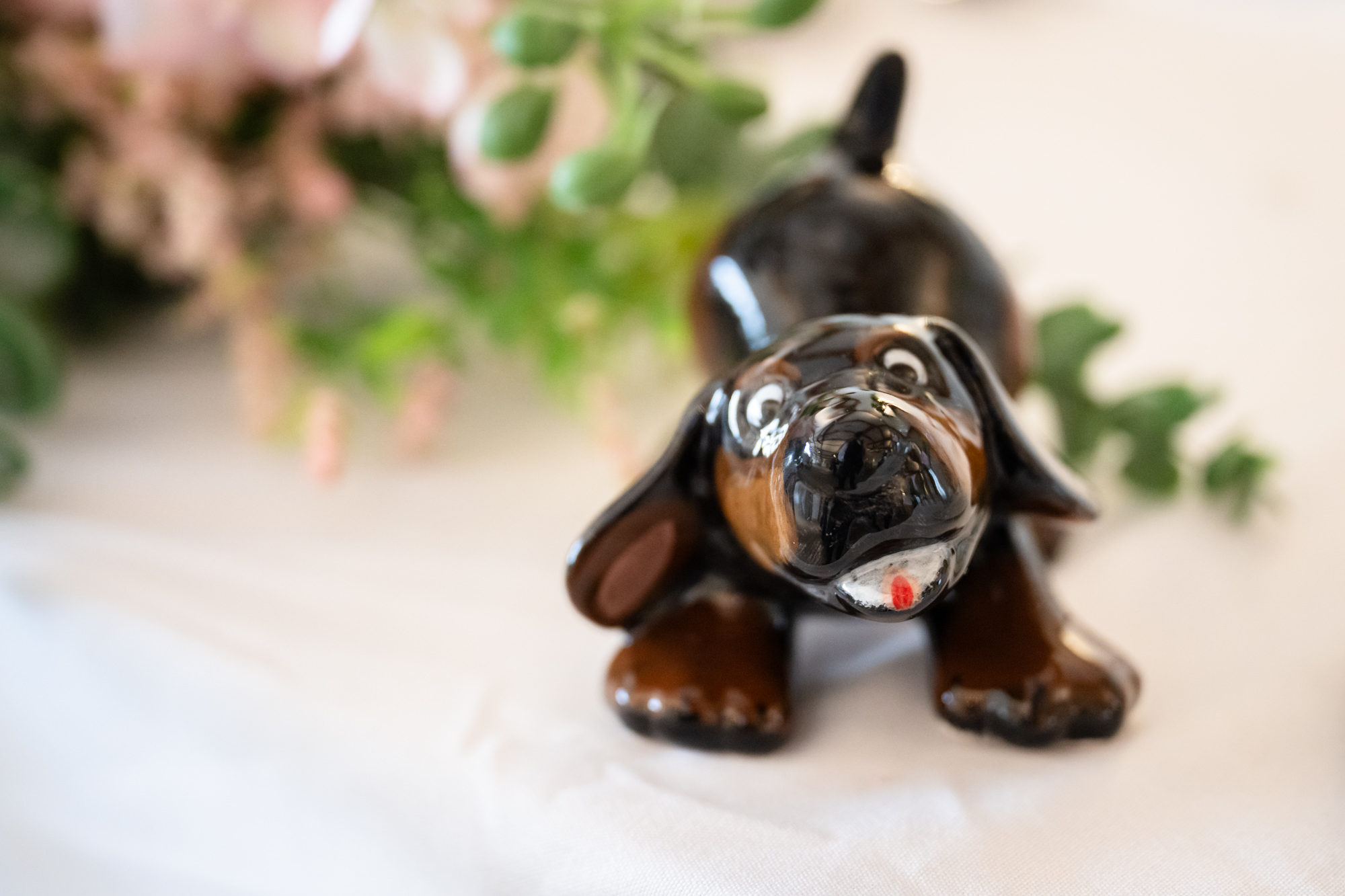 A ceramic replica of a sausage dog