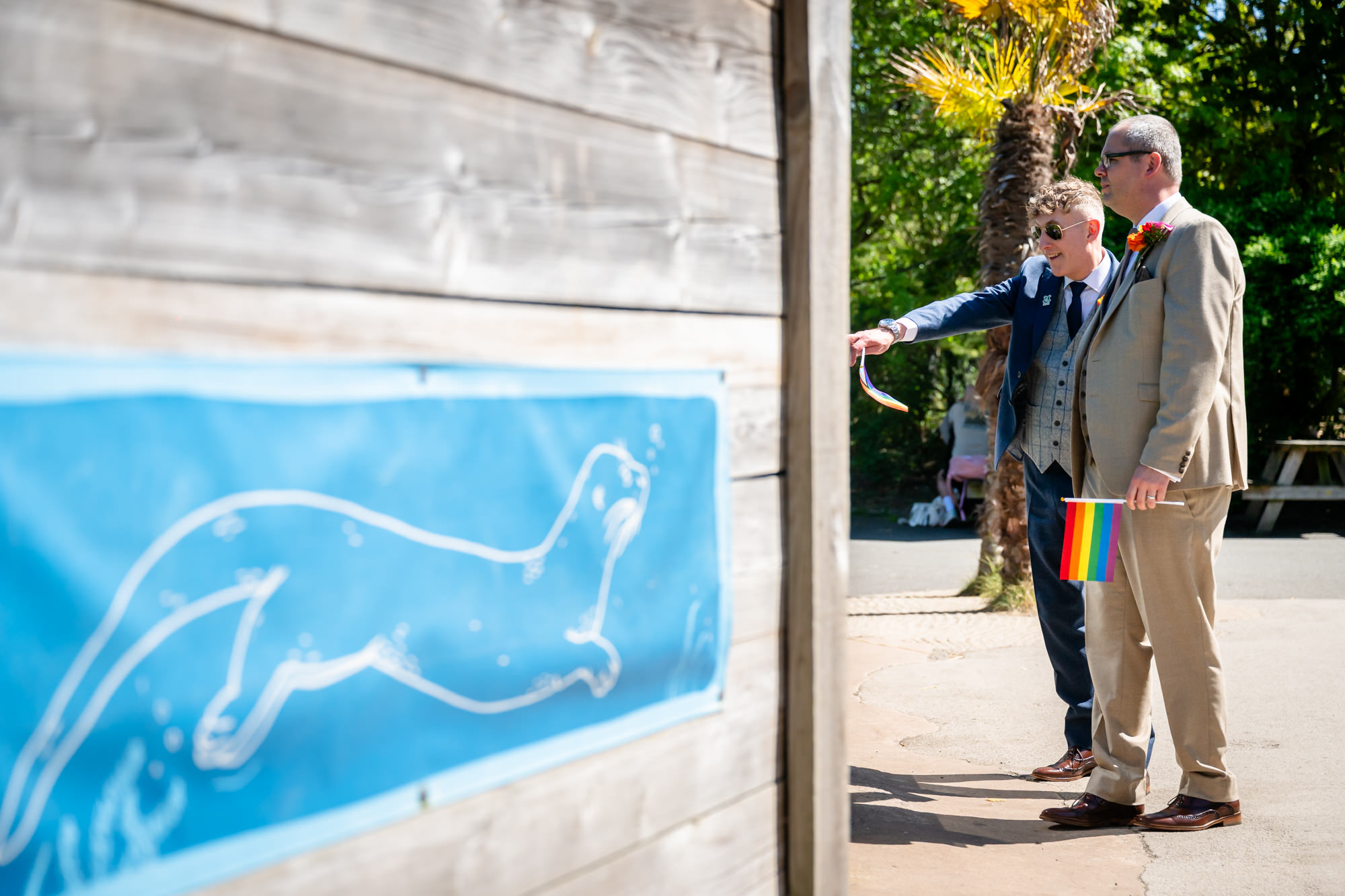 Marc and Dom pause by a painted enclosure sign on their walk around Chester Zoo.