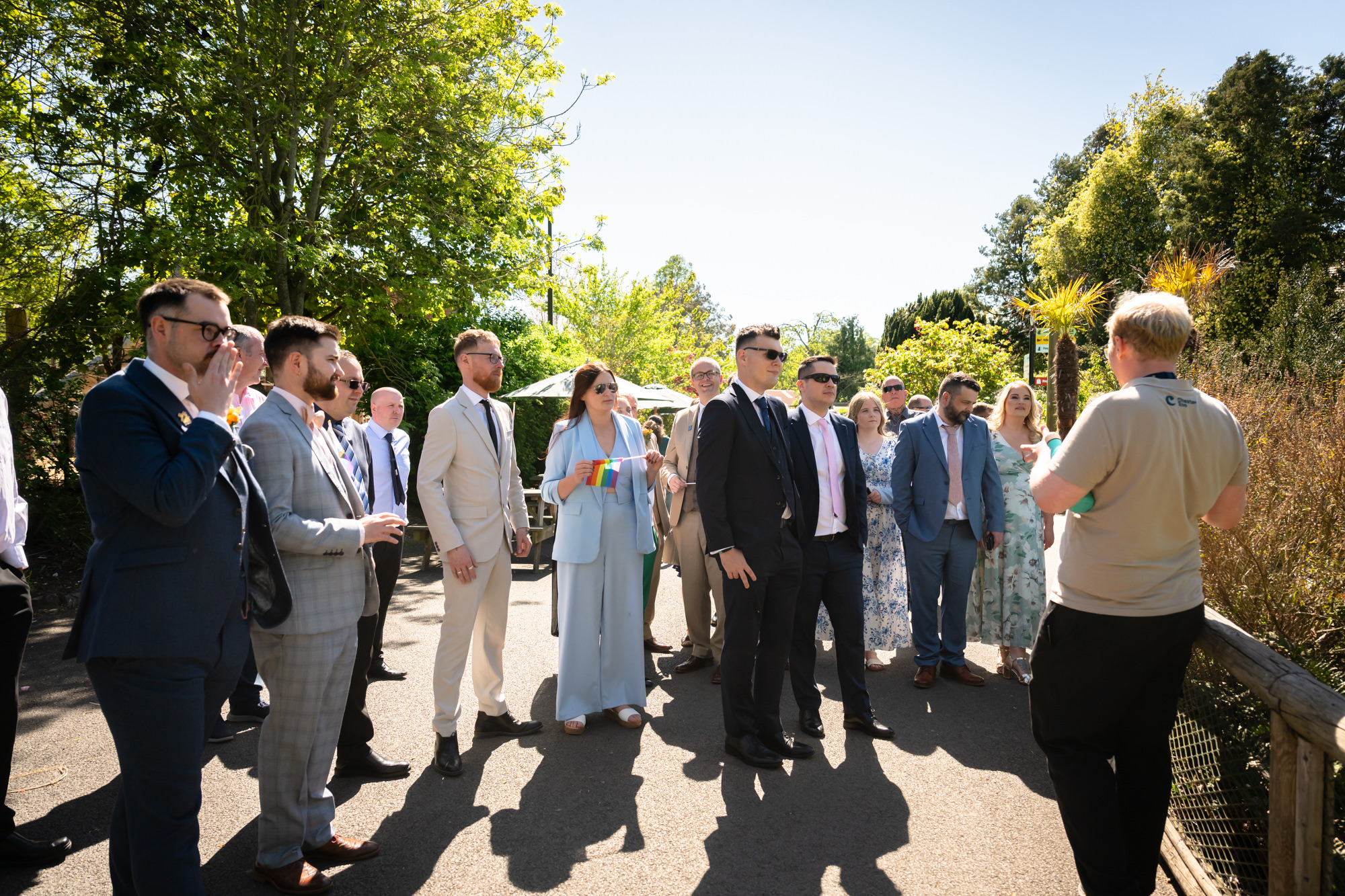 Wedding guests gather for a private ranger tour at Chester Zoo.