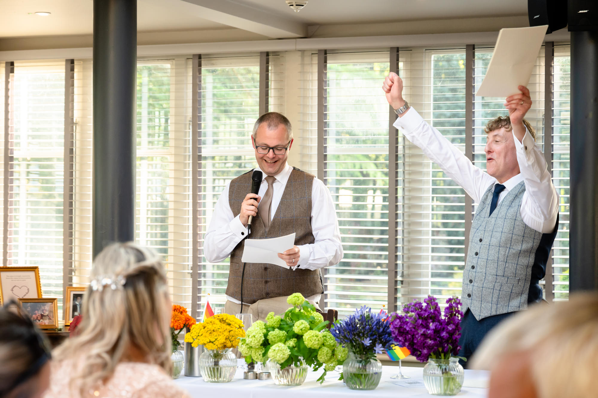Marc cheers during the couple's joint speech at The Oakfield.