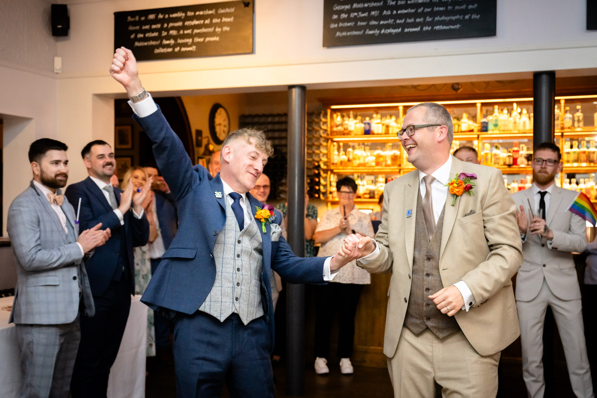Marc and Dom take to the floor for their first dance as guests cheer at The Oakfield.