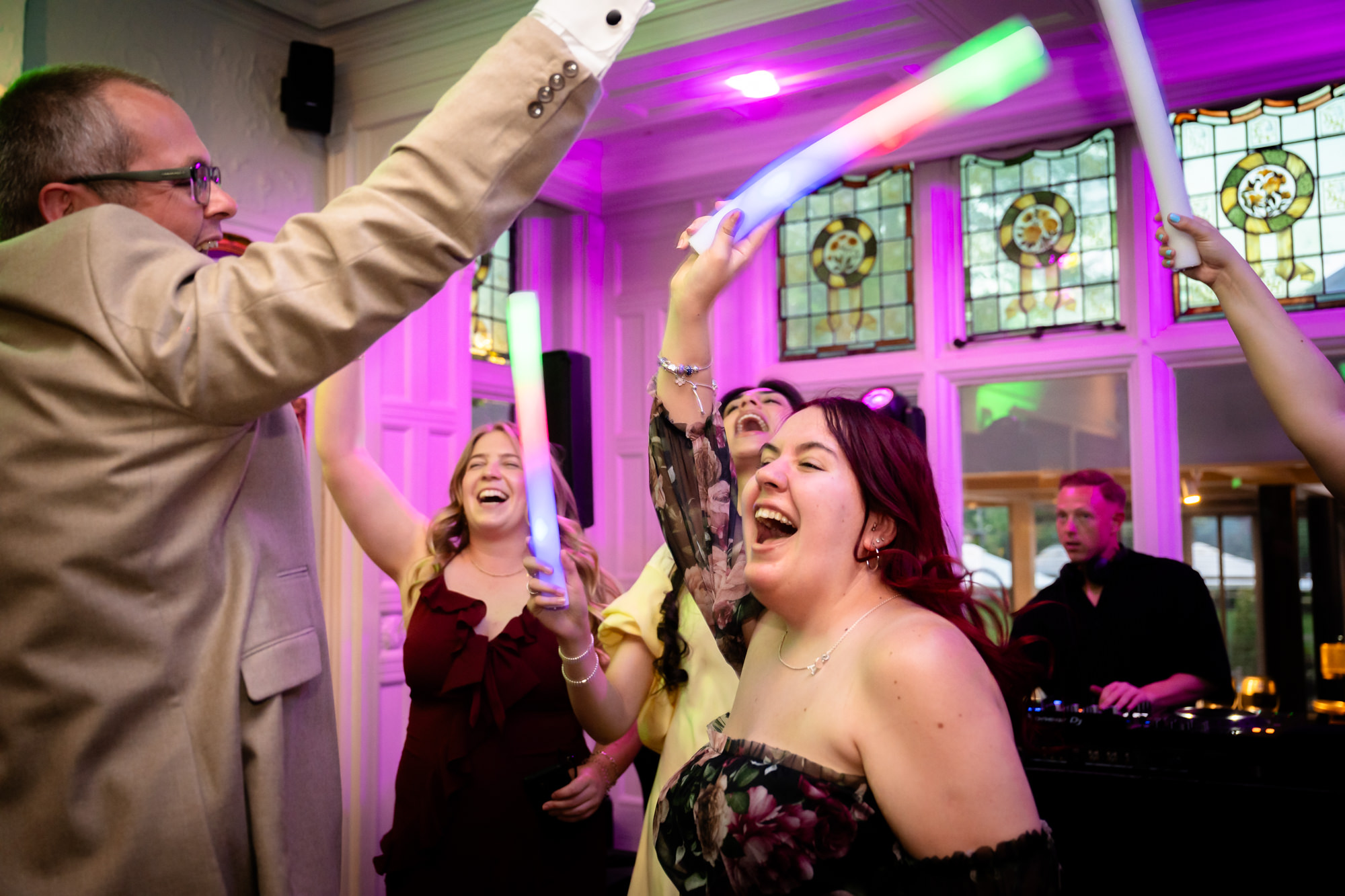 Dom dances with guests as the DJ keeps the floor going.