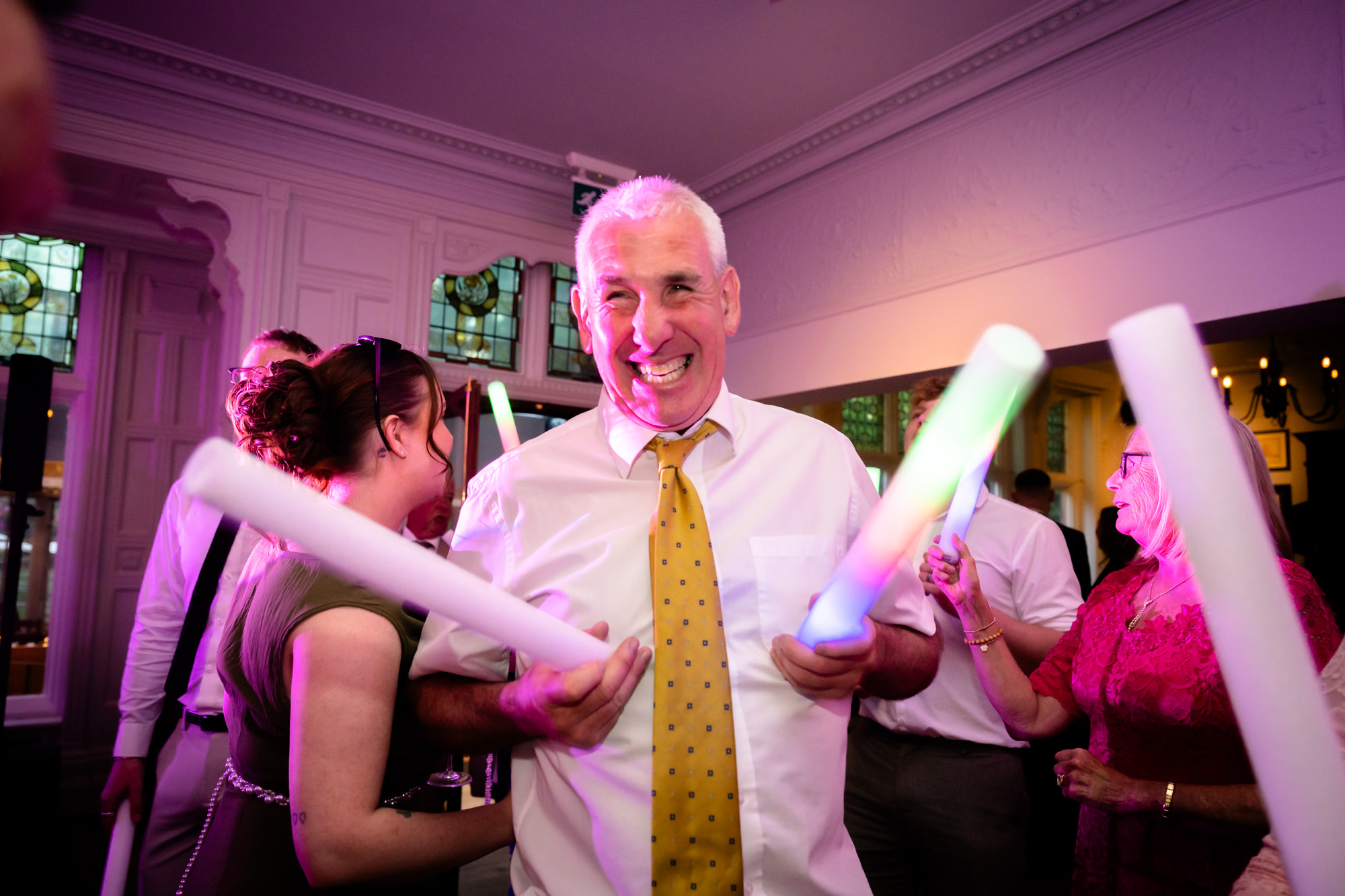 Guests enjoy the glow sticks on the dance floor at The Oakfield.